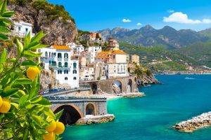using a watermaker at the Amalfi cityscape on coast line of mediterranean sea, Italy
